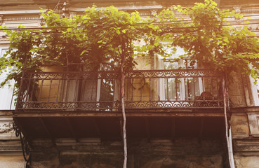 Old Tbilisi architecture, window and exterior decor in summer day.