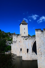 The medieval Pont Valentre crossing the Lot River in Cahors, France