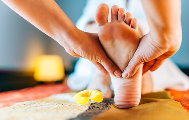 Woman Feet Massage in Thai Massage Saloon | Background