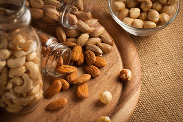 mix of nuts on a wooden table