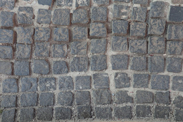 Photo of a stone paving. Stone texture, top view.