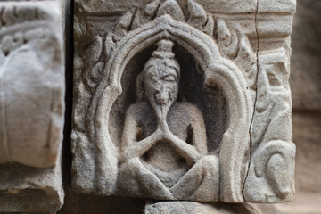 Stone carved bas-relief of Banteay Samre temple in Angkor Wat, Cambodia. Human figure bas-relief. Khmer architecture