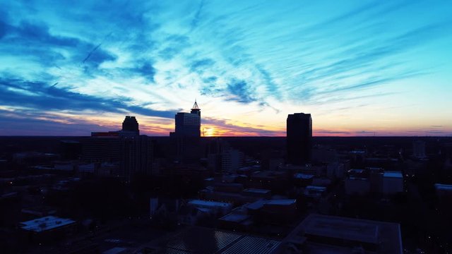 Sunset over Raleigh skyline, wide aerial
