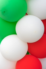 Many colorful balloons decorated wall as background