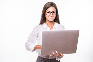 Young happy business woman holding laptop isolated on white background