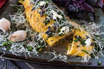 Omelet with herbs, Basil and Parmesan and garlic