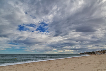 tropical beach under gloomy sky