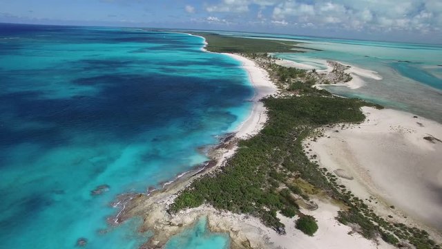 Tropical beach in Turks and Caicos, panning aerial