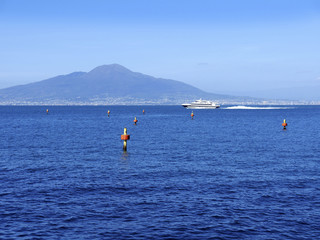 Vesuvius and the ferry to Capri from the original fishing harbour of Marina Grande in Sorrento Italy
