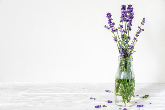 Fototapeta Still life with a beautiful bouquet of lavender flowers. holiday or wedding background with copy space
