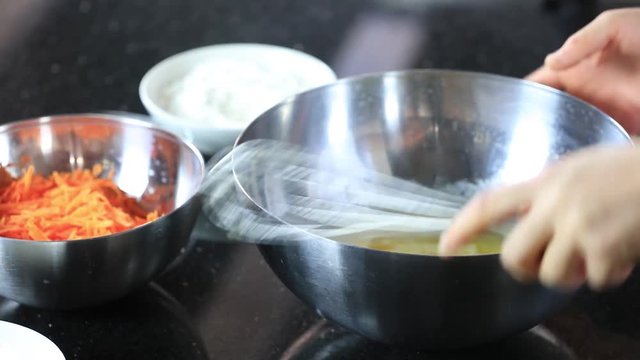 pastry chef mixes eggs