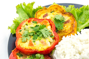 Scrambled eggs fried in the ring of sweet pepper.