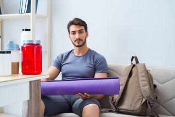 Young man getting ready for gym sports