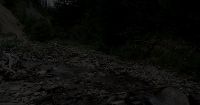Drone flight in summer over mountain stream in the Nockberge mountains in the Thunder Gorge in Carinthia in innerkrems, lungau, schoenfeld