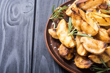 Homemade grilled potatoes with rosemary