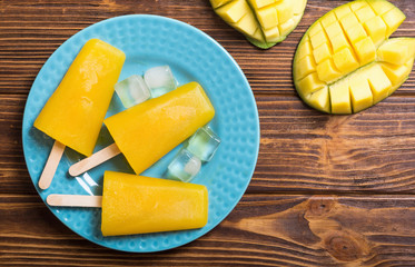 Homemade mango popsicle