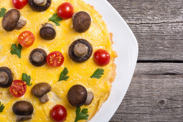 Omelette with mushroom , tomato and parsley