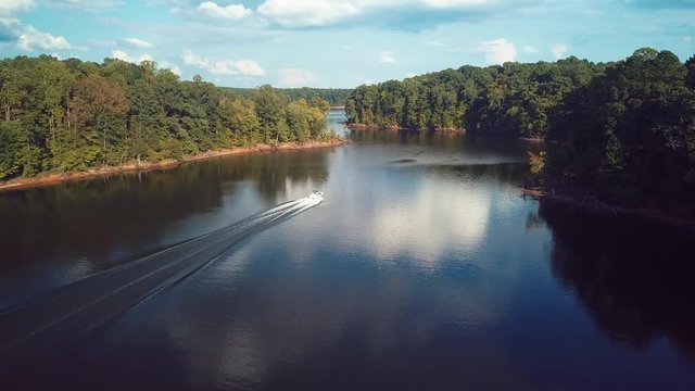 Boat on rural lake, aerial