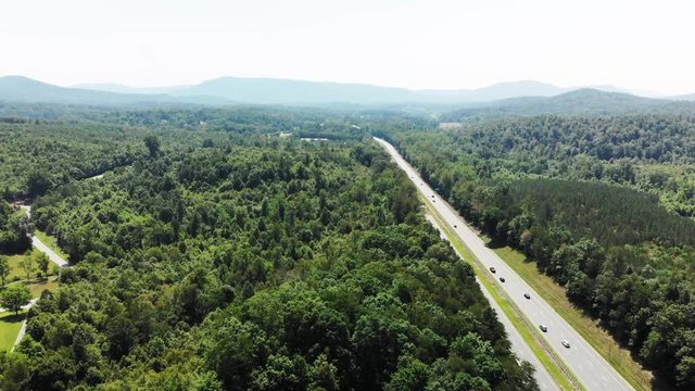 Wide aerial, rural highway in Asheville