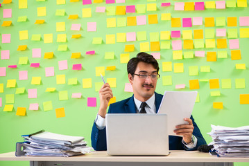 Businessman having trouble with his priorities