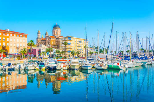 Marina in Saint Raphael dominated by church of our lady of the victory