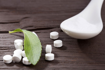 Fresh green Stevia herb and extract powder - Stevia rebaudiana.