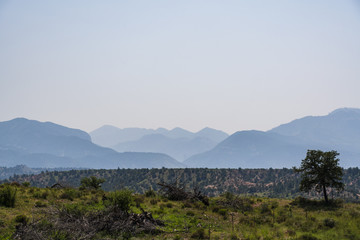 Fototapeta na wymiar A hazy view of a distant New Mexico mountain range.