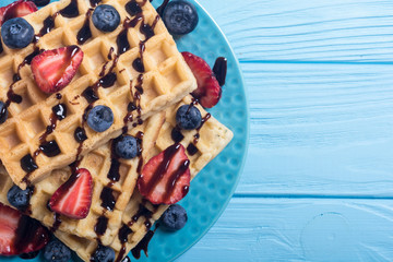 Belgian waffles with strawberry and blueberry