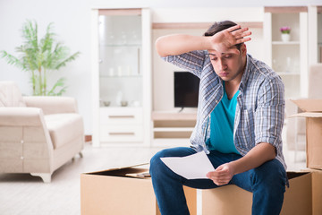 Unemployed man receiving foreclosure notice letter