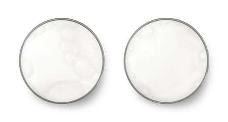Top view of fresh milk glass with bubbles isolated on white background. Breakfast drink. ( Clipping...