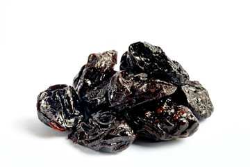 Prunes or dried plum on white background