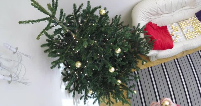 Decorating christmas tree in time lapse