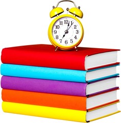Alarm Clock On Stacked Books - Isolated