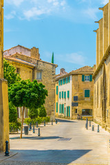 View of a narrow street in the center of Villeneuve les Avignon, France