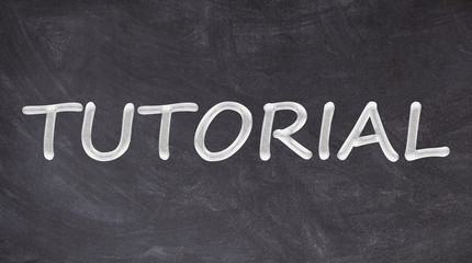 Obraz premium Tutorial written on blackboard