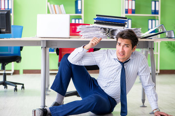 Frustrated businessman stressed from excessive work