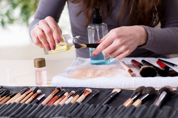 Make-up artist preparing brushes for work