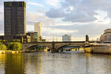 Philadelphia city skyline at sunset across Schuylkill river