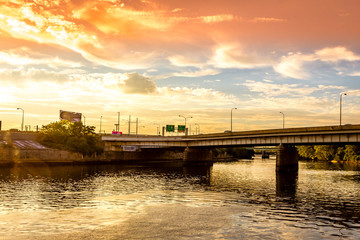 Philadelphia city skyline at sunset across Schuylkill river