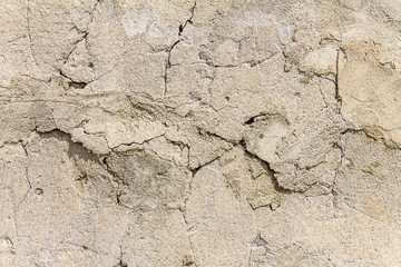 Old plastered wall as an abstract background for design