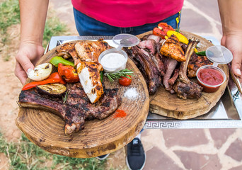 Meat cooked on the grill in the nature on the spacing