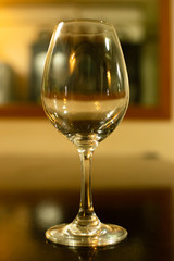 Wine glass placed on a table as isolated background