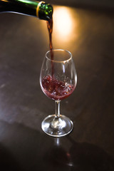 Wine glass with wine bottle