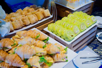 buffet food, catering food party at restaurant, mini canapes, snacks and appetizers