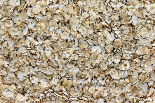 Oatmeal in instant flakes food background.