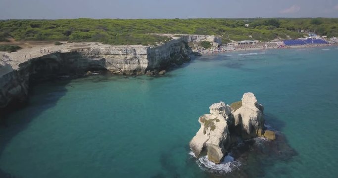 Italian coastline aerial drone view - Le Due Sorelle - Torre dell'Orso (Italy, Puglia, Salento)