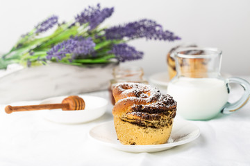 Buns (craffins) with poppy seeds and ice powder