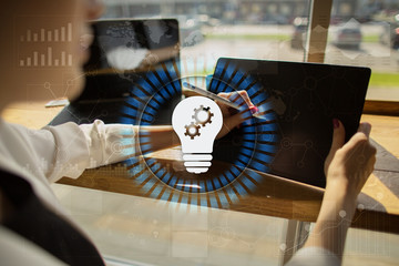 Lamp icon on virtual screen. Business solution. Innovation concept.