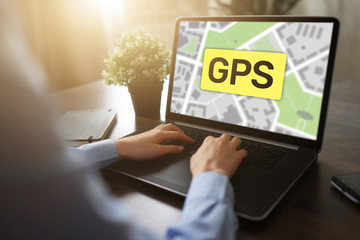 GPS Global Positioning System, Worldwide navigation and tracking concept with town maps on screen.