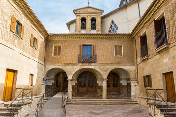 Fototapeta na wymiar Entrance to the Notre Dame de Puy basilica in Estella, Spain